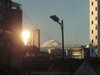 Вид из моего окна. 6.30 утра. Красавец вулкан на фоне синего неба в лучах восходящего солнца)))