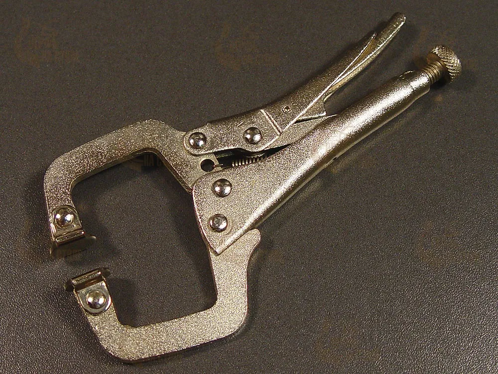 Быстросъёмная струбцина с подвижными подушечками